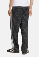 ADIDAS ORIGINALS Pantalone sportivo FIREBIRD LOOSE MONOGRAM nero da uomo KC9159 . ADIDAS ORIGINALS 