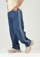 ADIDAS ORIGINALS Jeans Firebird Adicolor in denim medio da uomo KD1499 . ADIDAS ORIGINALS 