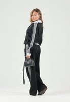 ADIDAS ORIGINALS Pantaloni CLASSIC TRACK PANTS nero da donna con iconiche 3-Stripes a contrasto KD7965 . ADIDAS ORIGINALS 