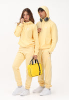 ADIDAS ORIGINALS Pantalone sportivo TREFOIL ESSENTIALS giallo per uomo e donna KE1159 . ADIDAS ORIGINALS 