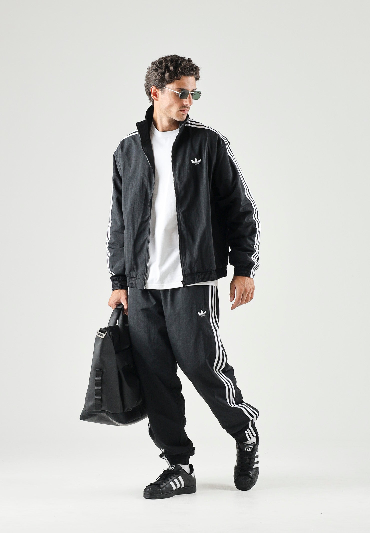 ADIDAS ORIGINALS Giacca a vento Firebird Woven nera da uomo KE1366 . ADIDAS ORIGINALS 