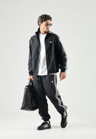ADIDAS ORIGINALS Giacca a vento Firebird Woven nera da uomo KE1366 . ADIDAS ORIGINALS 