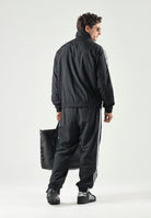 ADIDAS ORIGINALS Giacca a vento Firebird Woven nera da uomo KE1366 . ADIDAS ORIGINALS 