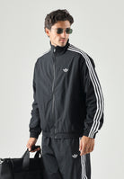 ADIDAS ORIGINALS Giacca a vento Firebird Woven nera da uomo KE1366 . ADIDAS ORIGINALS 