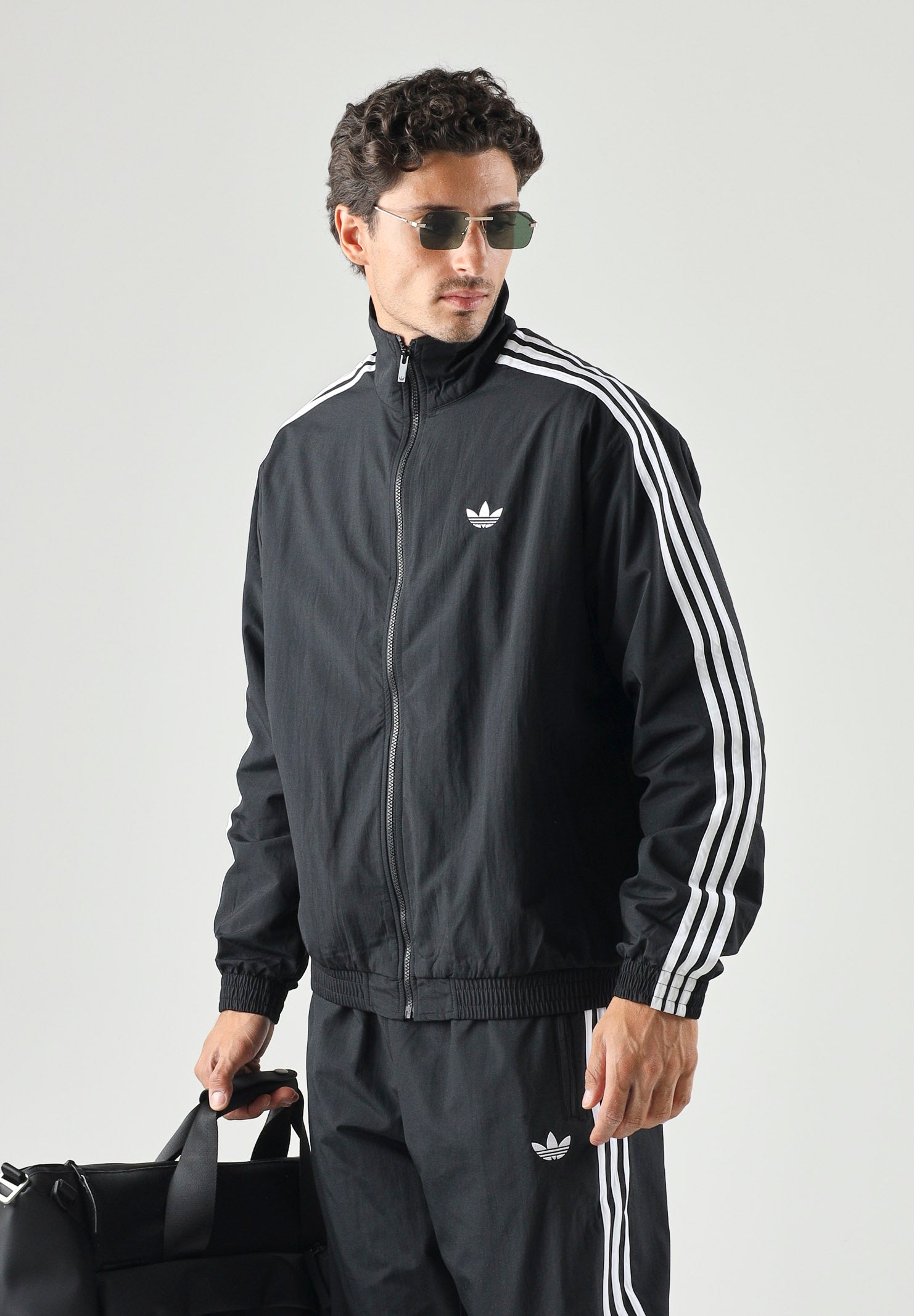 ADIDAS ORIGINALS Giacca a vento Firebird Woven nera da uomo KE1366 . ADIDAS ORIGINALS 