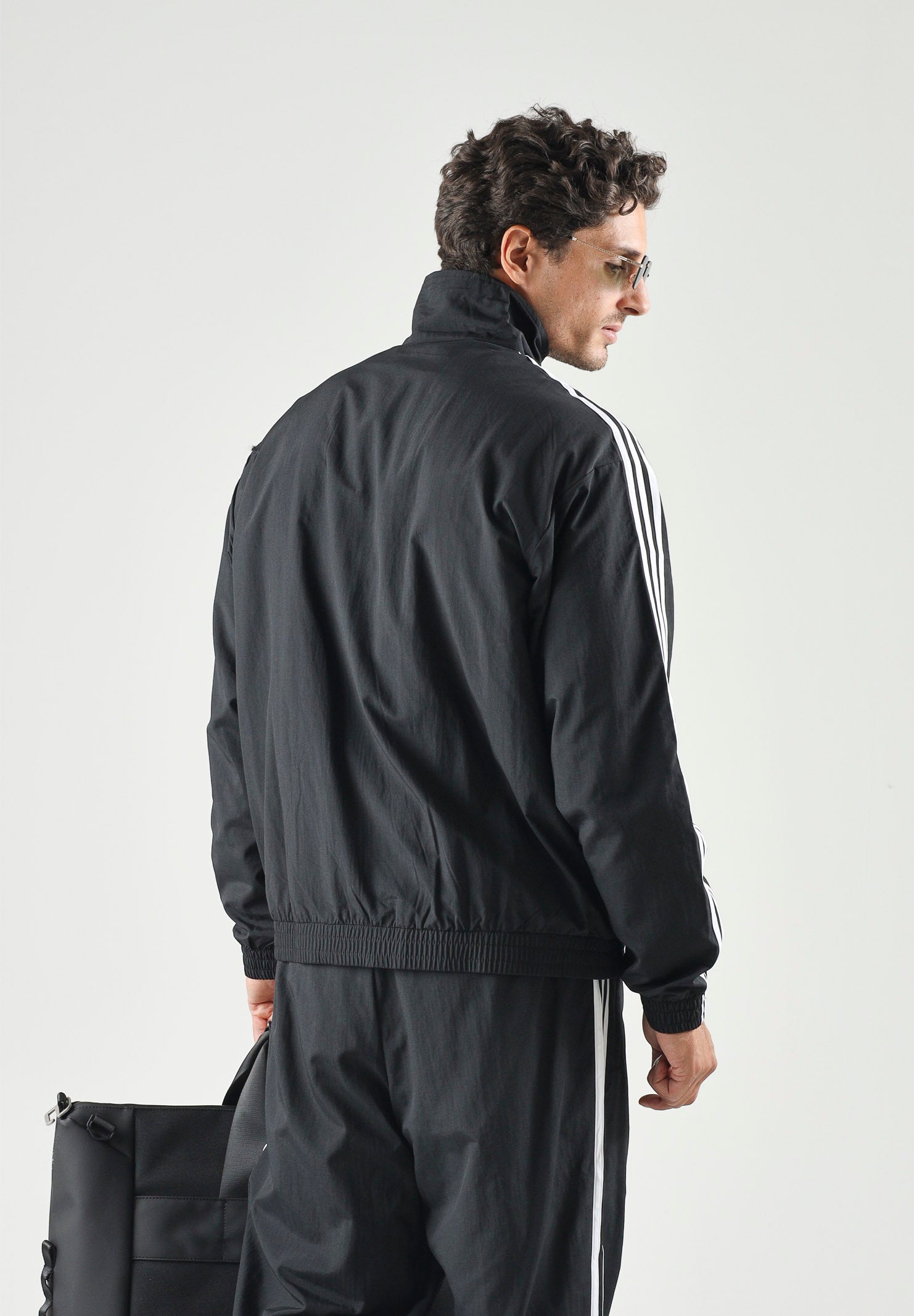 ADIDAS ORIGINALS Giacca a vento Firebird Woven nera da uomo KE1366 . ADIDAS ORIGINALS 