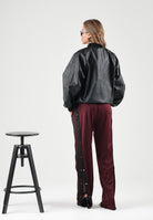 ADIDAS ORIGINALS Giubbotto in eco-pelle SST nero da donna con chiusura full zip e tasche laterali KQ6435 . ADIDAS ORIGINALS 