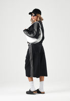 ADIDAS ORIGINALS Giubbotto di jeans SST 2.0 DENIM TRACKTOP  nero da donna con zip integrale e bande laterali a contrasto. KQ6467 . ADIDAS ORIGINALS 
