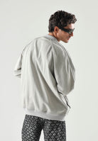 ADIDAS ORIGINALS Giacca SST OVERSIZED DENIM grigio chiaro da donna in tinta unita KQ6472 . ADIDAS ORIGINALS 