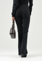ADIDAS ORIGINALS Leggings ADICOLOR CLASSICS FLARED nero da donna con taglio svasato sul fondo e vita alta. KR3600 . ADIDAS ORIGINALS 