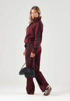 ADIDAS ORIGINALS Pantaloni WIDE LEG maroon-bordeux per donna con vita elasticizzata e bande laterali a contrasto. KS4669 . ADIDAS ORIGINALS 