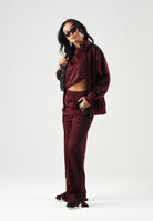 ADIDAS ORIGINALS Pantaloni WIDE LEG maroon-bordeux per donna con vita elasticizzata e bande laterali a contrasto. KS4669 . ADIDAS ORIGINALS 