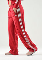 ADIDAS ORIGINALS Pantaloni FIREBIRD LOOSE TRACK PANTS Team Victory Red rosso da donna KS4670 . ADIDAS ORIGINALS 