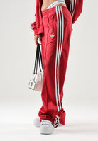 ADIDAS ORIGINALS Pantaloni sportivi FIREBIRD LOOSE A victory red rosso da donna con mini logo iconico KS4670 . ADIDAS ORIGINALS 