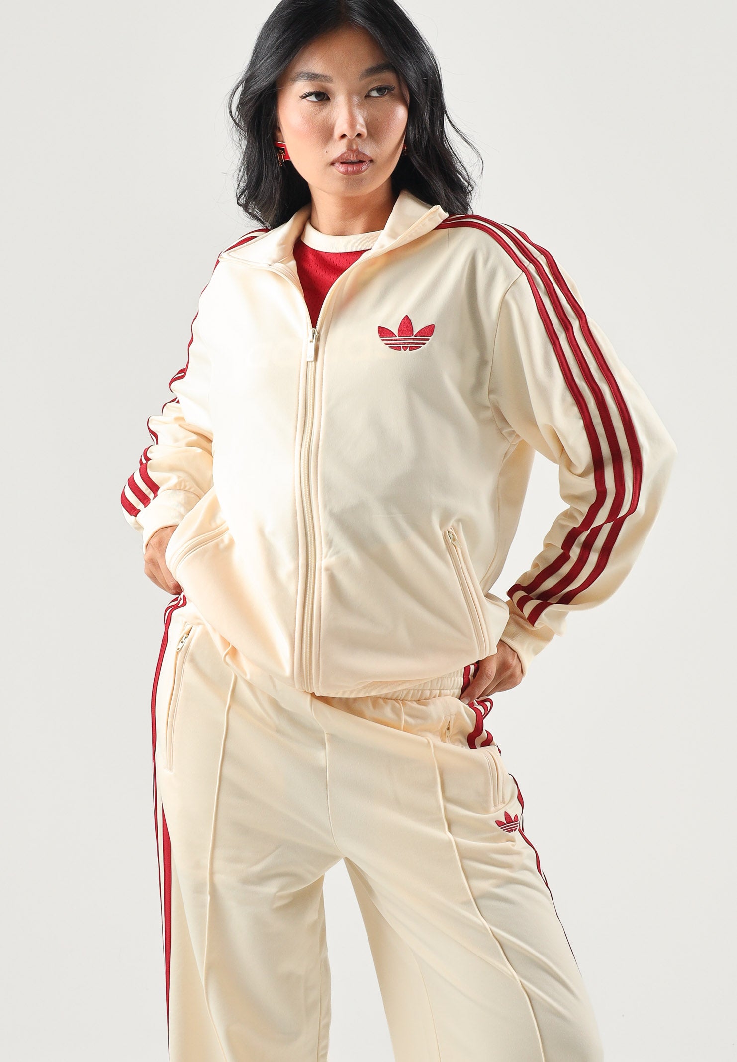 ADIDAS ORIGINALS Felpa con zip FIREBIRD TRACK TOP LOOSE Warm Vanilla per uomo e donna con iconiche 3-Stripes rosse KS4674 . ADIDAS ORIGINALS 