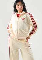 ADIDAS ORIGINALS Felpa con zip FIREBIRD TRACK TOP LOOSE Warm Vanilla per uomo e donna con iconiche 3-Stripes rosse KS4674 . ADIDAS ORIGINALS 