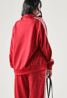 ADIDAS ORIGINALS Felpa con zip rossa per donna con colletto alto e iconiche tre strisce bianche. KS4675 . ADIDAS ORIGINALS 
