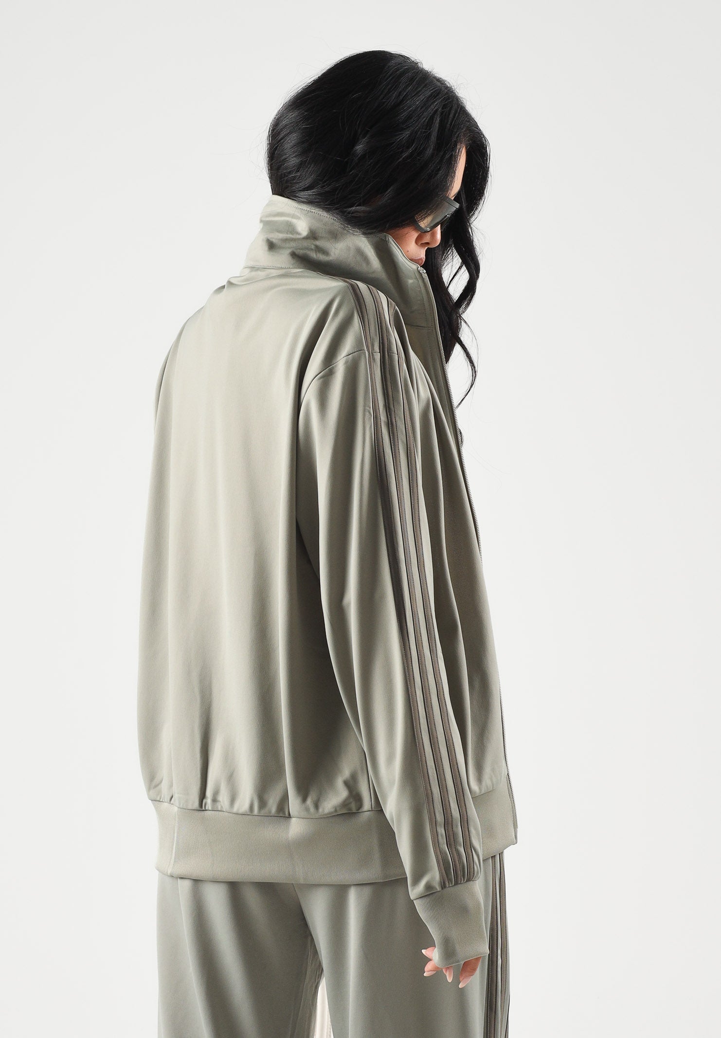 ADIDAS ORIGINALS Felpa con zip FIREBIRD verde fango per uomo e donna con colletto alto e bande laterali coordinate. KS4679 . ADIDAS ORIGINALS 