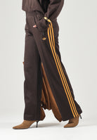 ADIDAS ORIGINALS Pantaloni FIREBIRD Auburn-marrone per uomo e donna con logo iconico laterale KS4741 . ADIDAS ORIGINALS 