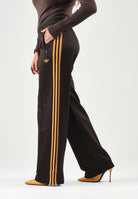 ADIDAS ORIGINALS Pantaloni FIREBIRD Auburn-marrone per uomo e donna con logo iconico laterale KS4741 . ADIDAS ORIGINALS 