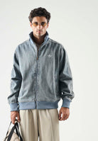 ADIDAS ORIGINALS Giubbotto FIREBIRD ADICOLOR denim-azzurro da uomo con effetto slavato e 3-Stripes sulle maniche. KS4970 . ADIDAS ORIGINALS 