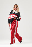ADIDAS ORIGINALS Pantaloni WIDE LEG rosso per donna con coulisse in vita e bande laterali bianche. KS7338 . ADIDAS ORIGINALS 