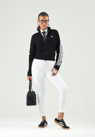 ADIDAS ORIGINALS Giubbotto TRACK TOP nero da donna con 3 stripes iconiche KS7366 . ADIDAS ORIGINALS 
