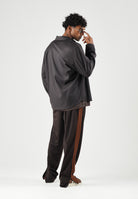 ADIDAS ORIGINALS Pantaloni FIREBIRD TRACK PANTS Aurora Coffee marrone per uomo e donna KS7477 . ADIDAS ORIGINALS 