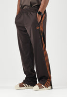 ADIDAS ORIGINALS Pantaloni FIREBIRD TRACK PANTS Aurora Coffee marrone per uomo e donna KS7477 . ADIDAS ORIGINALS 