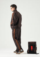 ADIDAS ORIGINALS Pantaloni FIREBIRD WOVEN Aurora Coffee-marrone da uomo con logo Trefoil ricamato. KS7499 . ADIDAS ORIGINALS 