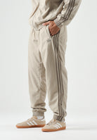 ADIDAS ORIGINALS  Pantaloni FIREBIRD WOVEN kaki beige da uomo<BR/> KS7503 . ADIDAS ORIGINALS 
