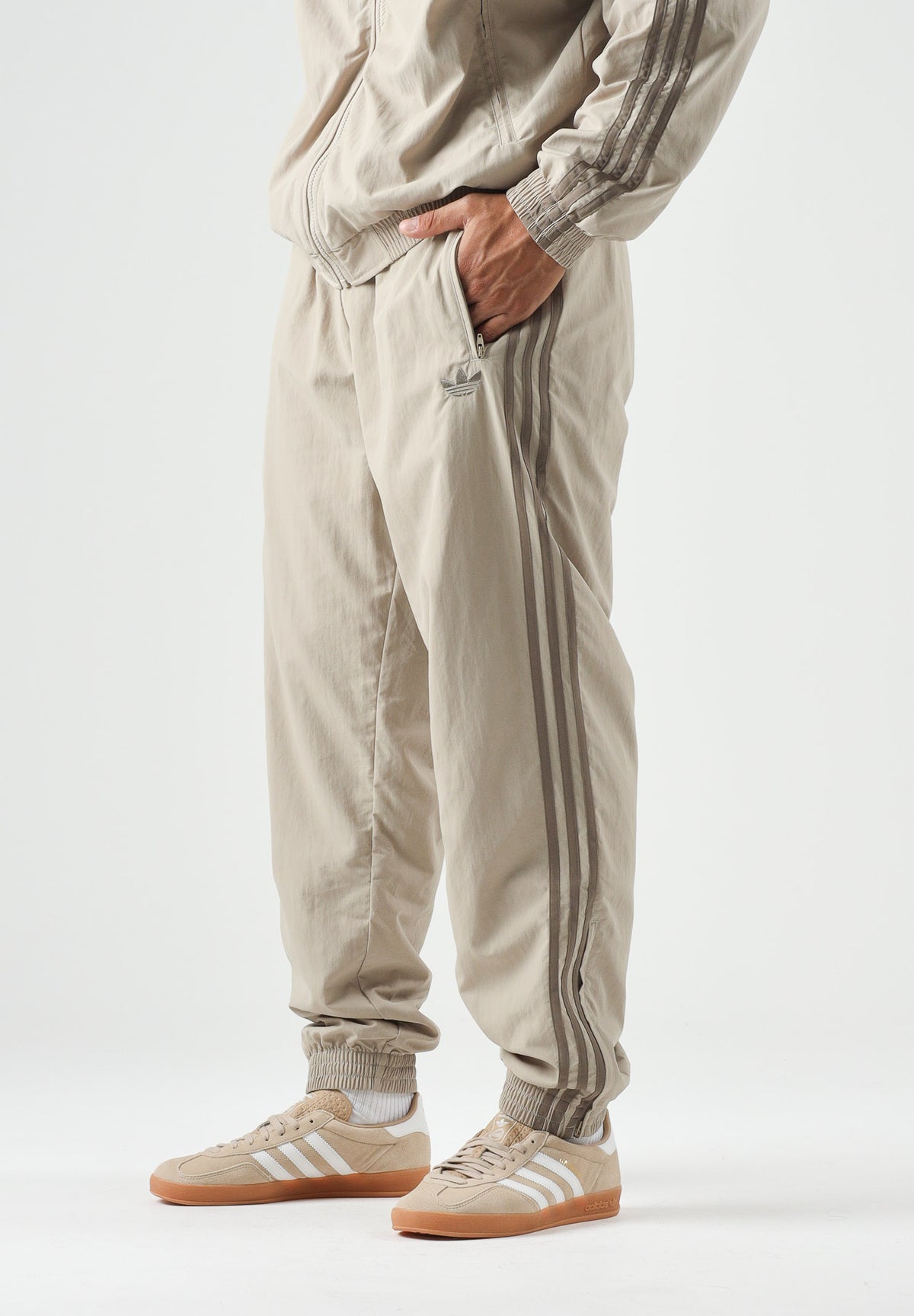 ADIDAS ORIGINALS  Pantaloni FIREBIRD WOVEN kaki beige da uomo<BR/> KS7503 . ADIDAS ORIGINALS 