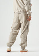 ADIDAS ORIGINALS  Pantaloni FIREBIRD WOVEN kaki beige da uomo<BR/> KS7503 . ADIDAS ORIGINALS 