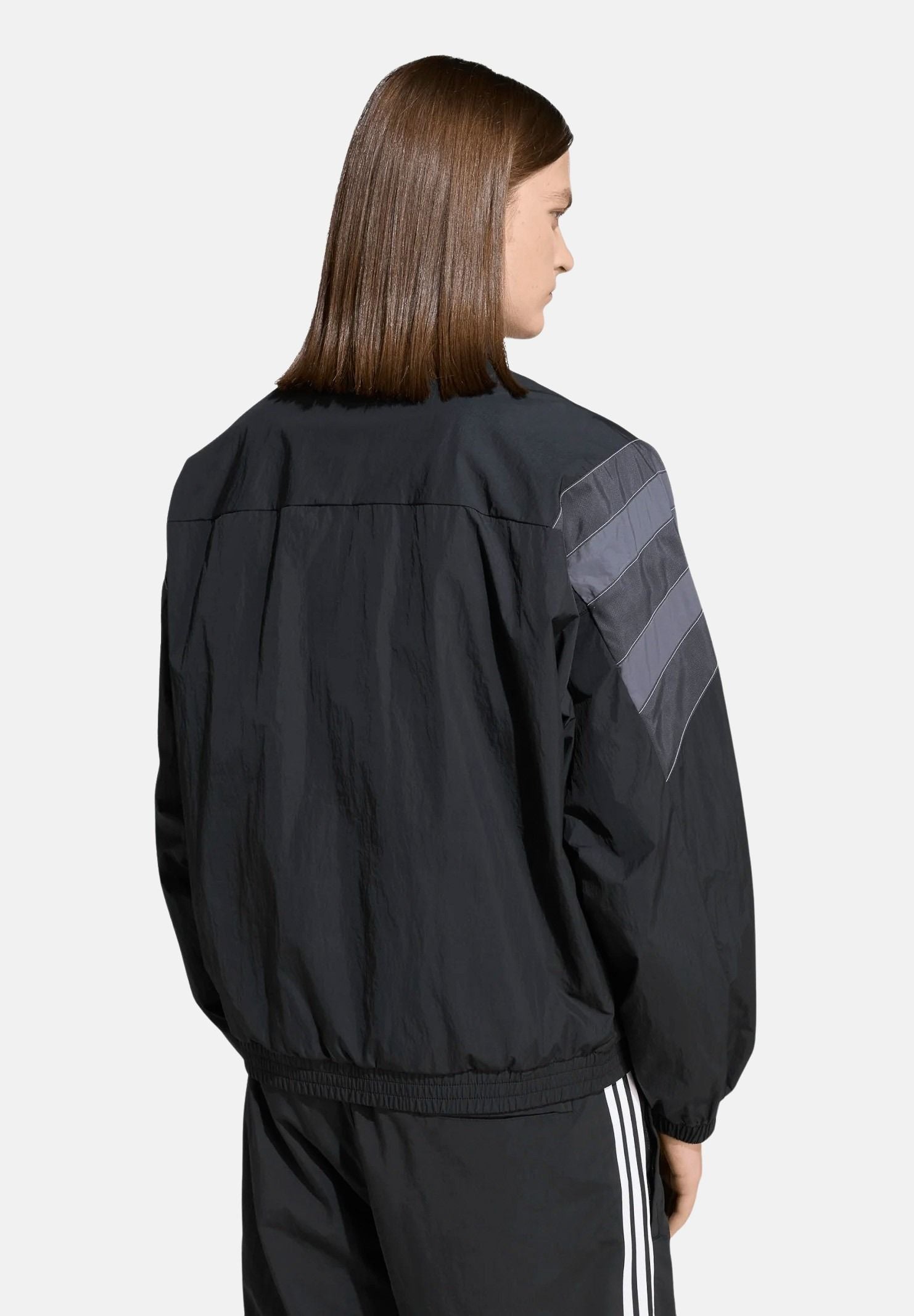 ADIDAS ORIGINALS Giacca a vento SANTIAGO nera e grigia da uomo KS8326 . ADIDAS ORIGINALS 