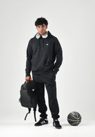 ADIDAS ORIGINALS Felpa cn cappuccio TREFOIL ESSENTIALS HOODIE nera da uomo  con logo iconico KS8920 . ADIDAS ORIGINALS 