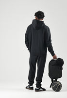 ADIDAS ORIGINALS Pantaloni TREFOIL ESSENTIALS PANTS nero da uomo in tinta unita KS8950 . ADIDAS ORIGINALS 