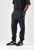 ADIDAS ORIGINALS Pantaloni TREFOIL ESSENTIALS PANTS nero da uomo in tinta unita KS8950 . ADIDAS ORIGINALS 