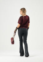 ADIDAS ORIGINALS  Pantaloni  SST BOOTCUT PANT neri da donna<BR/> KS9168 . ADIDAS ORIGINALS 
