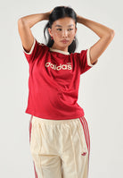 ADIDAS ORIGINALS T-shirt TMVIRE WARV rossa da donna con logo frontale stampato. KS9840 . ADIDAS ORIGINALS 