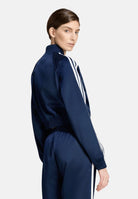 ADIDAS ORIGINALS Giacca SATIN NIGHT indigo blu notte da donna con iconiche 3-Stripes bianche <BR/> KS9948 . ADIDAS ORIGINALS 