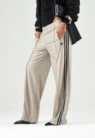 ADIDAS ORIGINALS Pantaloni beige/nero da donna con 3-Stripes laterali a contrasto. KS9974 . ADIDAS ORIGINALS 