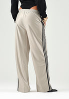ADIDAS ORIGINALS Pantaloni beige/nero da donna con 3-Stripes laterali a contrasto. KS9974 . ADIDAS ORIGINALS 