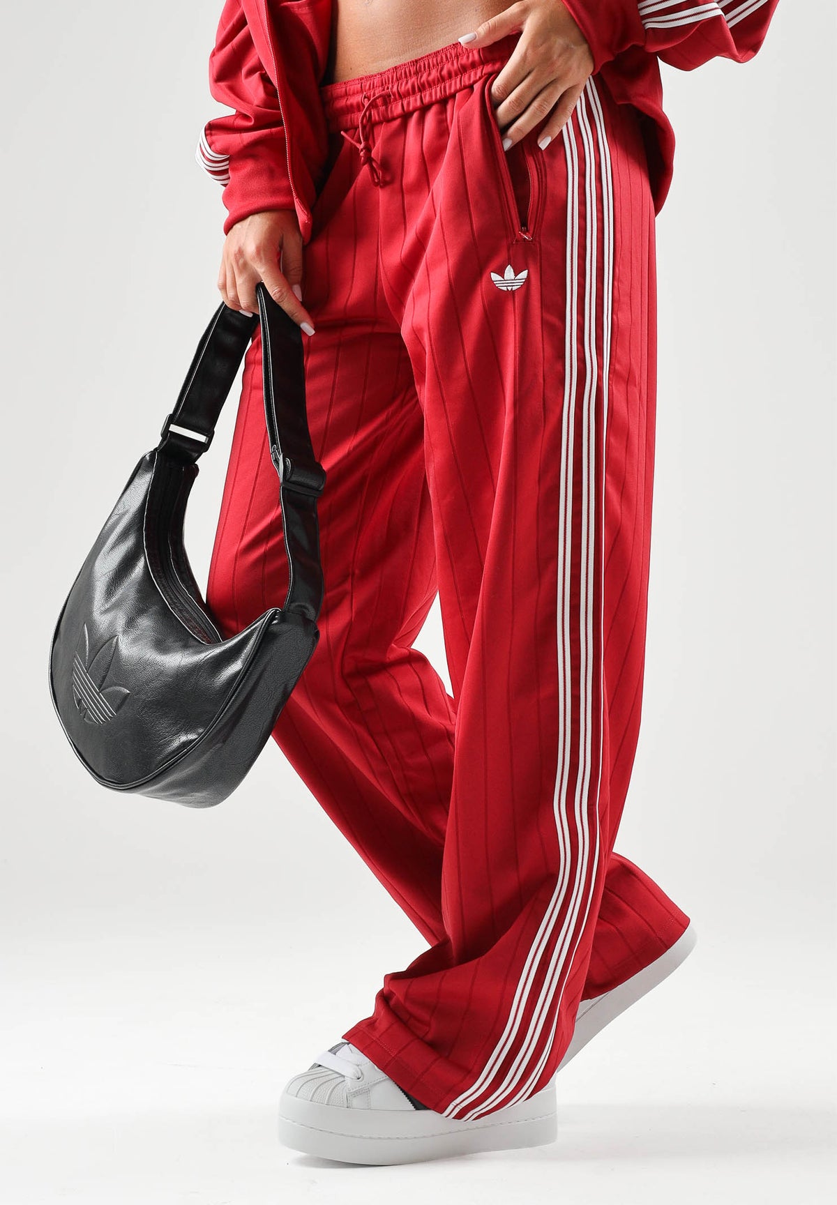 ADIDAS ORIGINALS Pantaloni ADIBREAK TRACK PANTS rosso per donna con bottoni a pressione laterali. KS9977 . ADIDAS ORIGINALS 