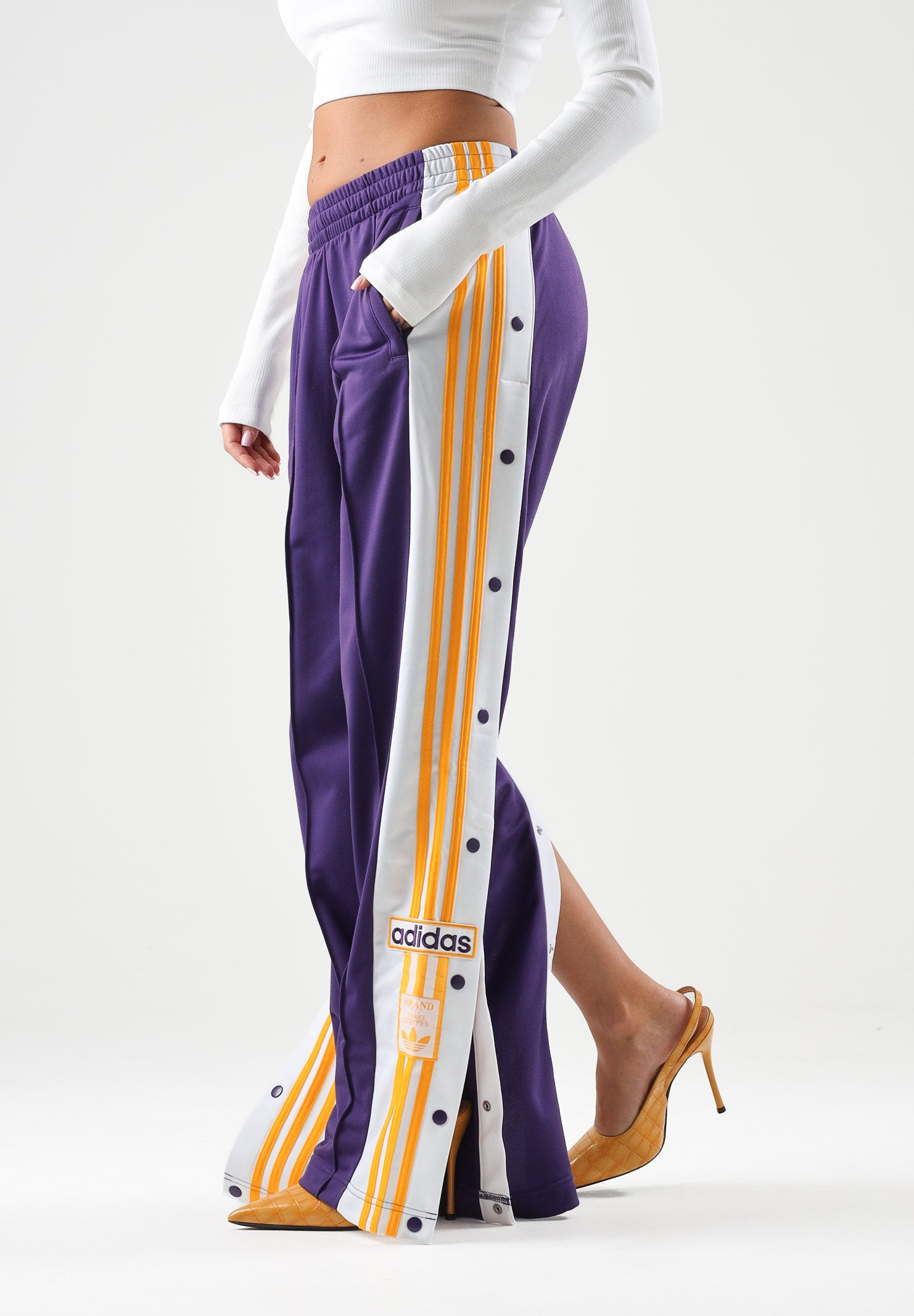 ADIDAS ORIGINALS Pantaloni FIREBIRD  viola per uomo e donna con bottoni automatici laterali e strisce bianche KT0026 . ADIDAS ORIGINALS 