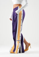ADIDAS ORIGINALS Pantaloni FIREBIRD  viola per uomo e donna con bottoni automatici laterali e strisce bianche KT0026 . ADIDAS ORIGINALS 