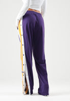 ADIDAS ORIGINALS Pantaloni FIREBIRD  viola per uomo e donna con bottoni automatici laterali e strisce bianche KT0026 . ADIDAS ORIGINALS 