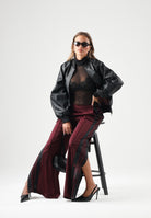 ADIDAS ORIGINALS Pantaloni FIREBIRD bordeaux da donna con bande laterali nere e vita elasticizzata KT0029 . ADIDAS ORIGINALS 