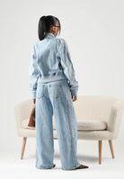 ADIDAS ORIGINALS Jeans ADICOLOR denim chiaro da donna con gamba ampia e tre strisce laterali. KT2651 . ADIDAS ORIGINALS 