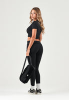 ADIDAS ORIGINALS Leggings nero da donna con design stampato e iconici dettagli sportivi a contrasto. KT4771 . ADIDAS ORIGINALS 