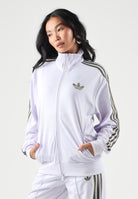 ADIDAS ORIGINALS Felpa con zip  FIREBIRD lilla da donna con 3-stripes iconiche e mini logo KU8195 . ADIDAS ORIGINALS 